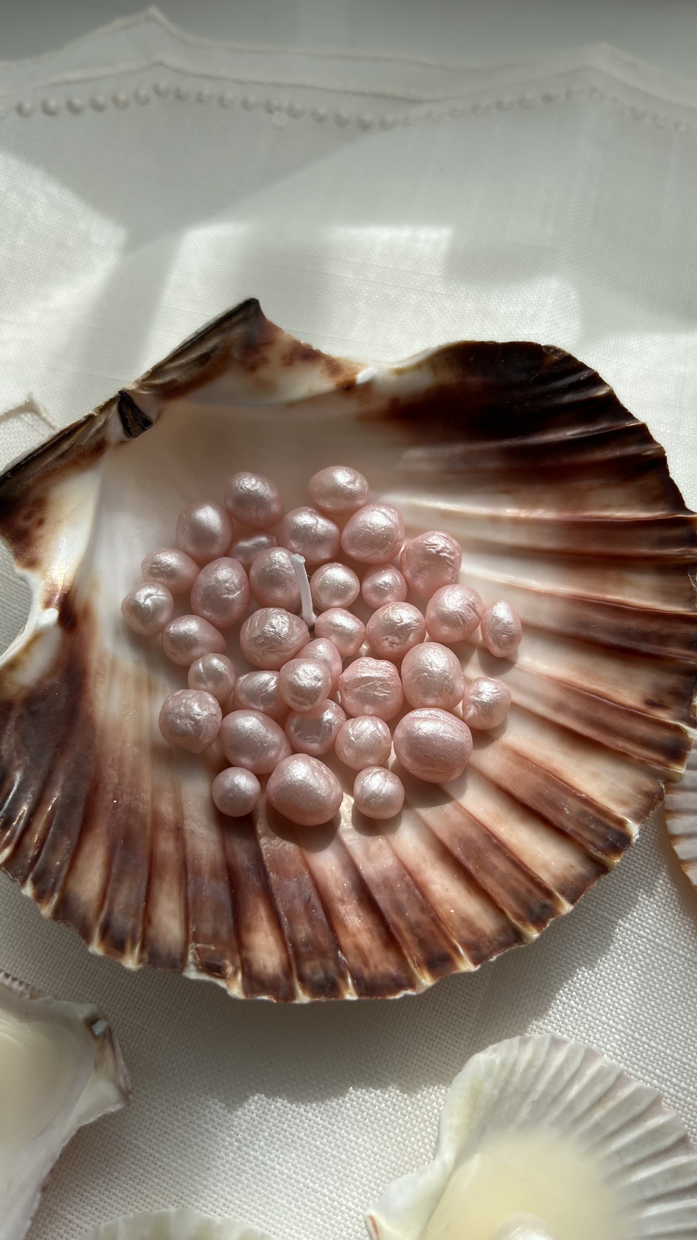 Kerze Perlen in echter Muschel 